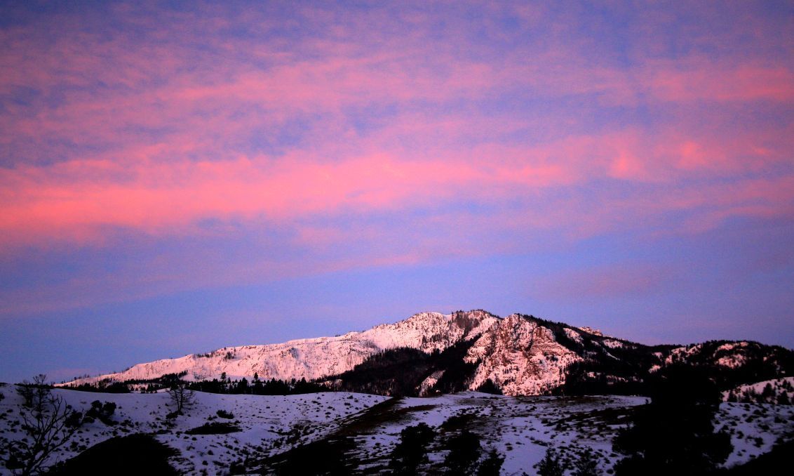 Sunrise paints mountain tops